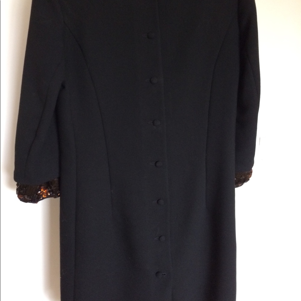 Schumacher wool crepe dress. Size 8 fits a 6 too.